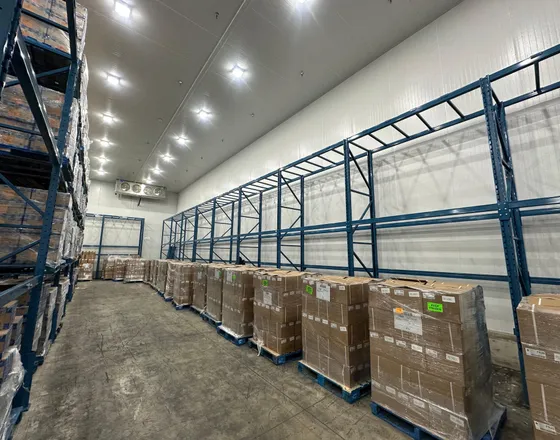 Pallet racking and stacked palletized inventory inside a warehouse